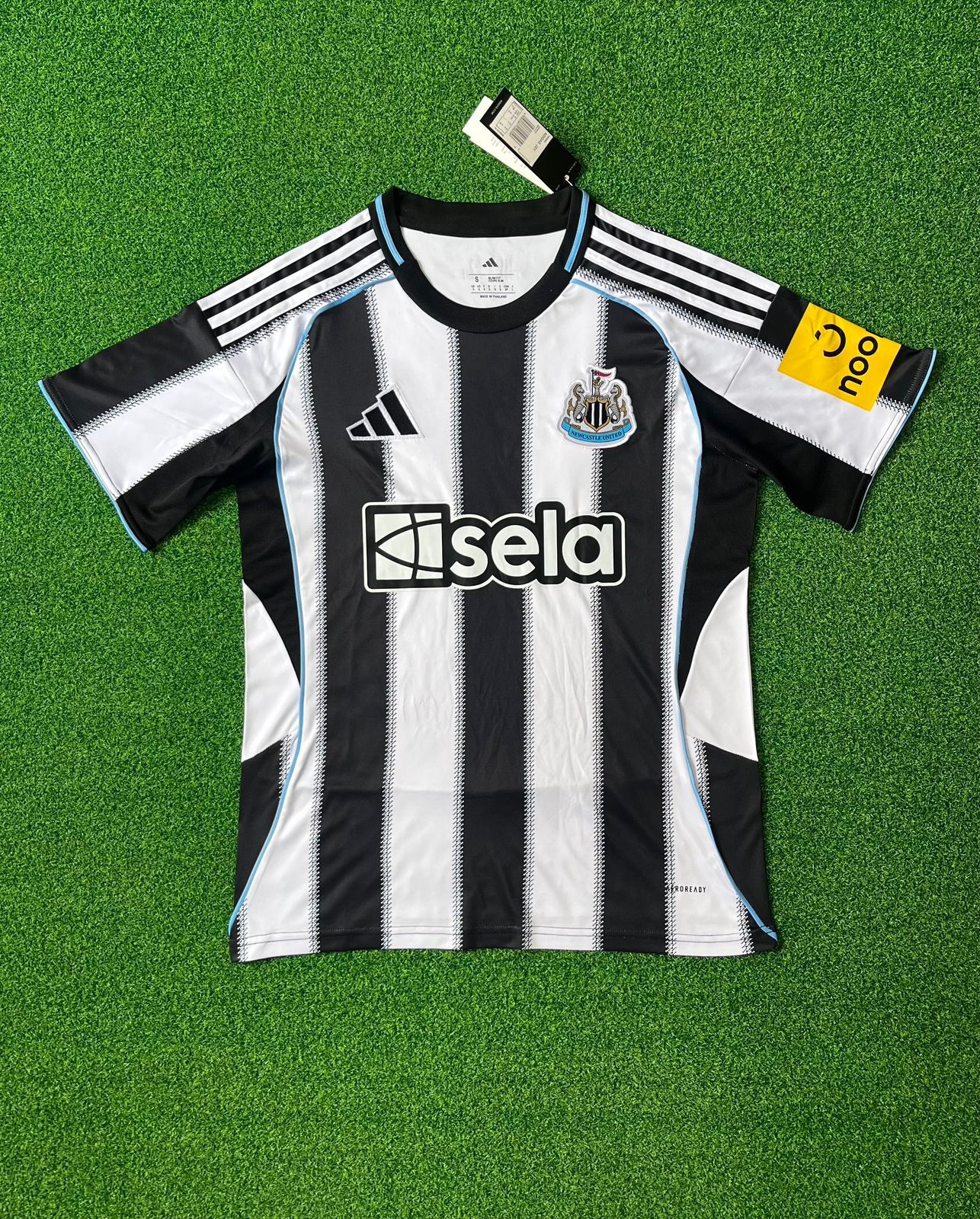 Newcastle United – Black/White Striped Fan Jersey
